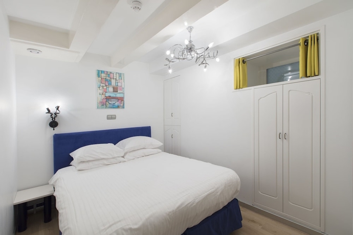 Imagen de la habitación del Hotel Dutch Masters Short Stay Apartments. Foto 12