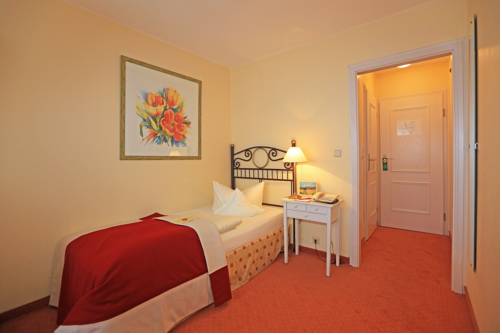 Imagen de la habitación del Hotel Dünenburg. Foto 16