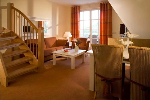 Imagen de la habitación del Hotel D&uuml;nenmeer Ferienwohnungen and -h&auml;user. Foto 10