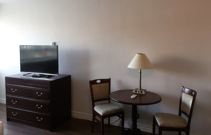 Imagen de la habitación del Hotel Duvernay Studios and Suites. Foto 2