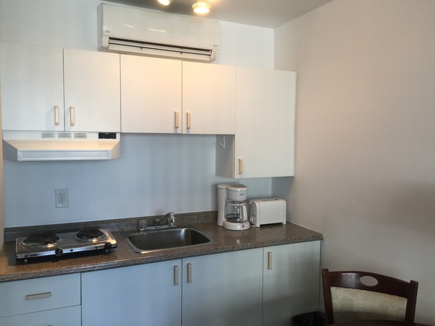 Imagen de la habitación del Hotel Duvernay Studios and Suites. Foto 19