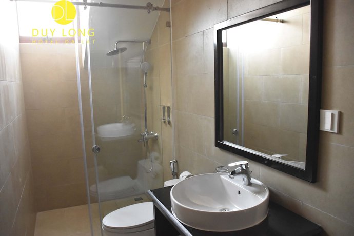 Imagen de la habitación del Hotel Duy Long. Foto 11