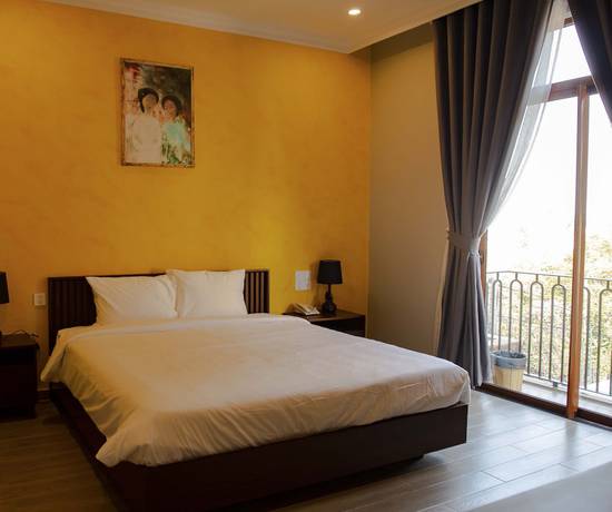 Imagen de la habitación del Hotel Duy Long. Foto 13