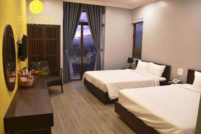 Imagen de la habitación del Hotel Duy Long. Foto 17