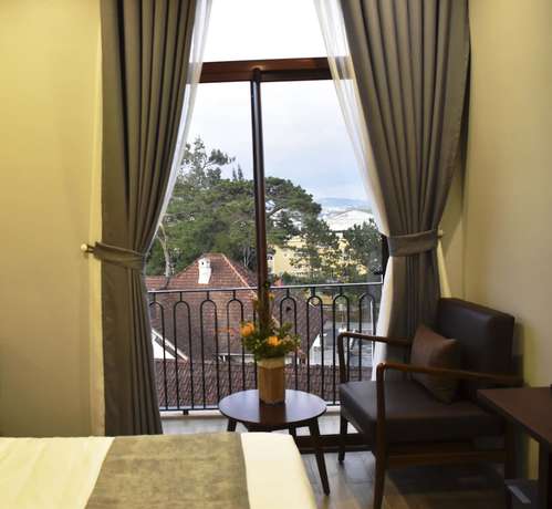 Imagen de la habitación del Hotel Duy Long. Foto 19