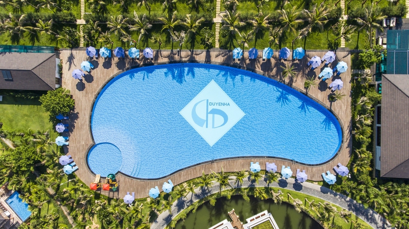 Imagen de la piscina del Hotel Duyen Ha Resort Cam Ranh. Foto 18