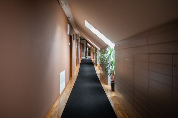 Imagen de la habitación del Hotel Dvor Jezer&scaron;ek Brnik. Foto 16