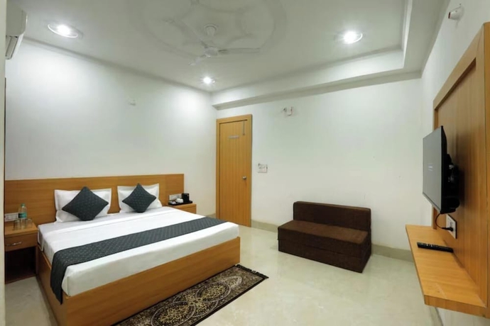 Imagen de la habitación del Hotel Dwarkadhish Plaza. Foto 5