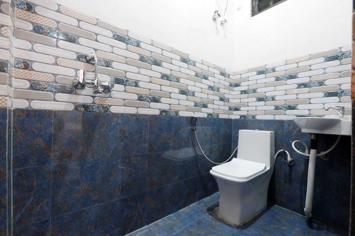 Imagen de la habitación del Hotel Dwarkadhish Plaza. Foto 9