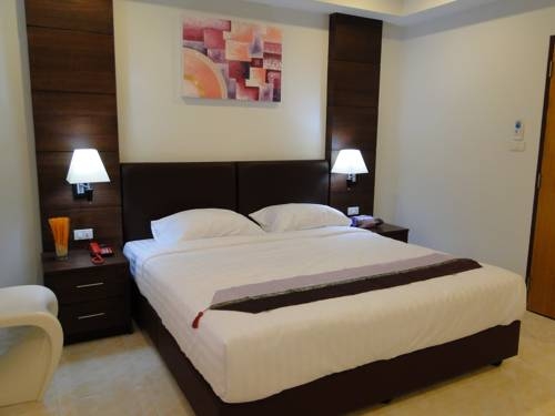 Imagen de la habitación del Hotel Dwell Apartment. Foto 26