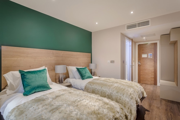 Imagen de la habitación del Hotel Dwell City Living. Foto 17