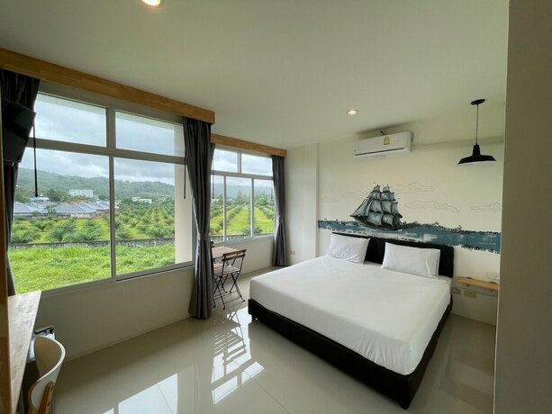 Imagen de la habitación del Hotel Dwell Phuket Airport. Foto 23