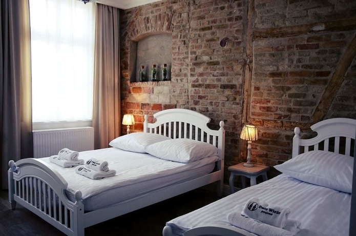 Imagen de la habitación del Hotel Dwie Wieże. Foto 2