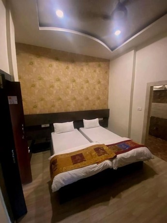 Imagen de la habitación del Hotel Dwivedi Hotels Sri Omkar Palace. Foto 12