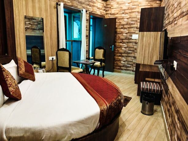 Imagen de la habitación del Hotel Dwivedi Hotels Sri Omkar Palace. Foto 13