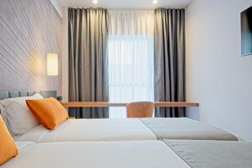 Imagen de la habitación del Hotel Dwo Yuste Alcalá. Foto 12