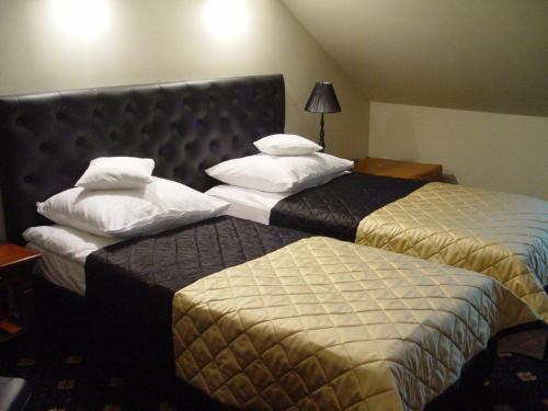 Imagen de la habitación del Hotel Dw&oacute;r w Zabużu. Foto 7