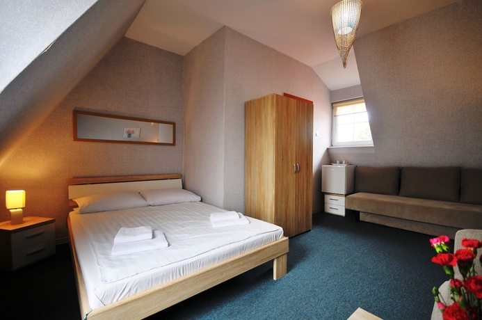 Imagen de la habitación del Hotel Dworek Familijny. Foto 3