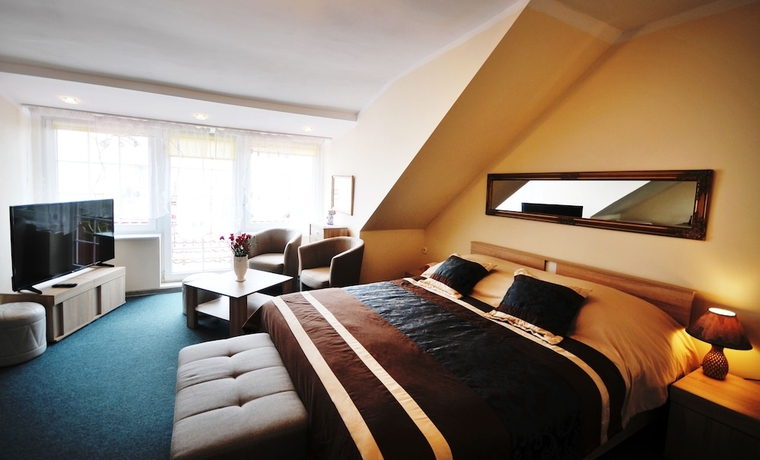 Imagen de la habitación del Hotel Dworek Familijny. Foto 6