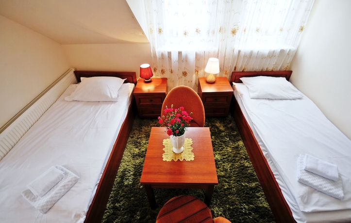 Imagen de la habitación del Hotel Dworek Familijny. Foto 9