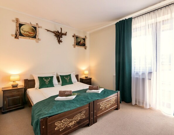 Imagen de la habitación del Hotel Dworek Mysliwski Hubert. Foto 13