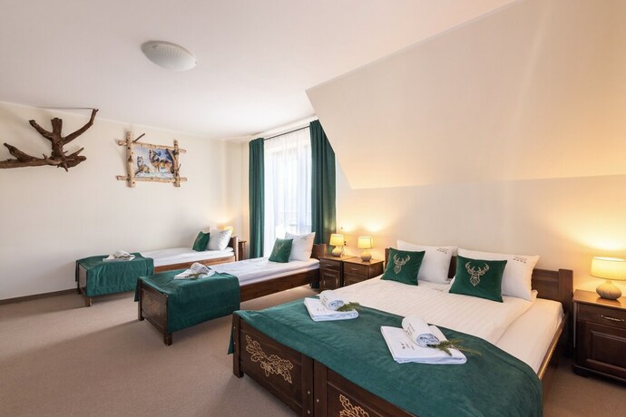 Imagen de la habitación del Hotel Dworek Mysliwski Hubert. Foto 16
