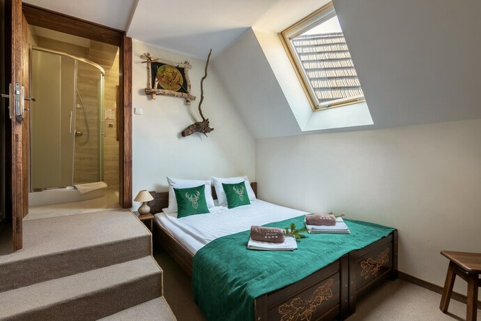 Imagen de la habitación del Hotel Dworek Mysliwski Hubert. Foto 17