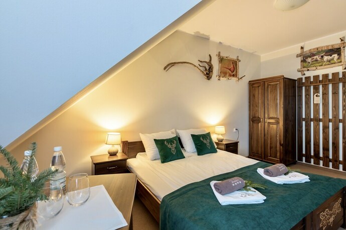 Imagen de la habitación del Hotel Dworek Mysliwski Hubert. Foto 20