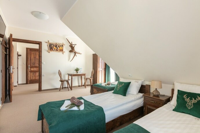 Imagen de la habitación del Hotel Dworek Mysliwski Hubert. Foto 21
