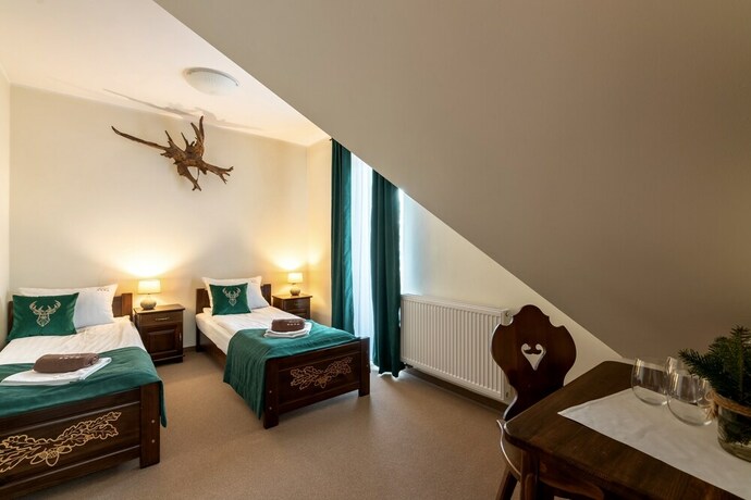 Imagen de la habitación del Hotel Dworek Mysliwski Hubert. Foto 22