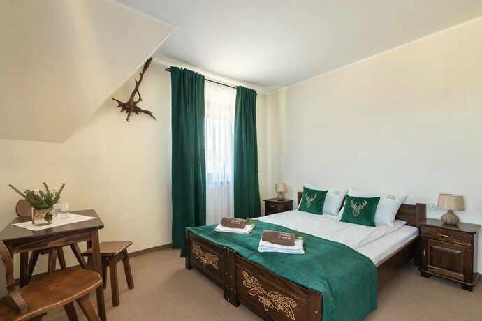Imagen de la habitación del Hotel Dworek Mysliwski Hubert. Foto 27