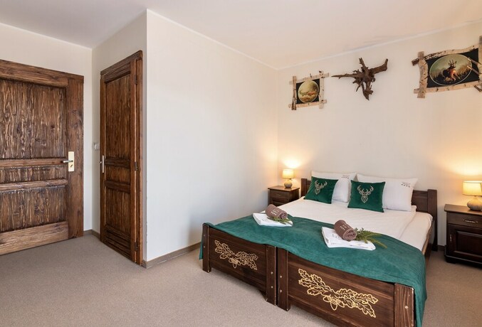 Imagen de la habitación del Hotel Dworek Mysliwski Hubert. Foto 29