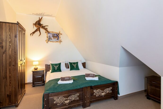 Imagen de la habitación del Hotel Dworek Mysliwski Hubert. Foto 31
