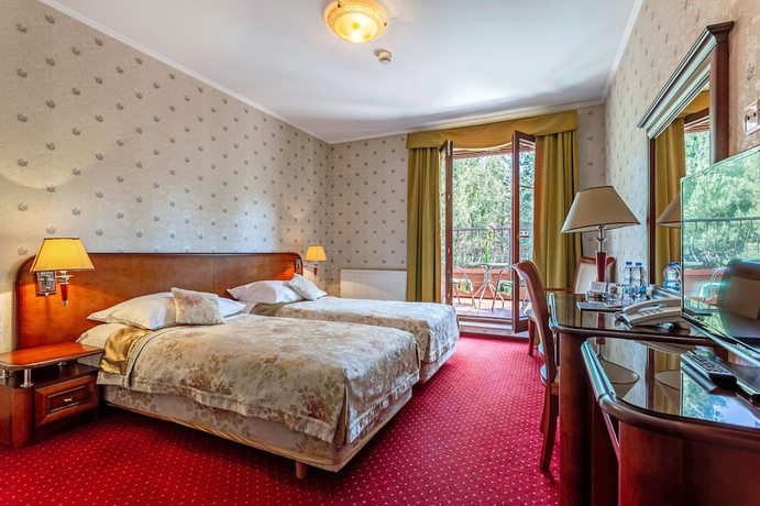 Imagen de la habitación del Hotel Dworek Tryumf Dąbrowscy Sp&oacute;łka Jawna. Foto 6