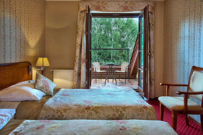 Imagen de la habitación del Hotel Dworek Tryumf Dąbrowscy Sp&oacute;łka Jawna. Foto 13