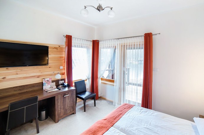Imagen de la habitación del Hotel Dworek Wapionka. Foto 13