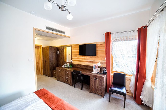 Imagen de la habitación del Hotel Dworek Wapionka. Foto 16