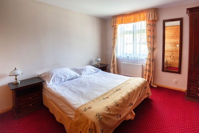 Imagen de la habitación del Hotel Dworek Wapionka. Foto 17