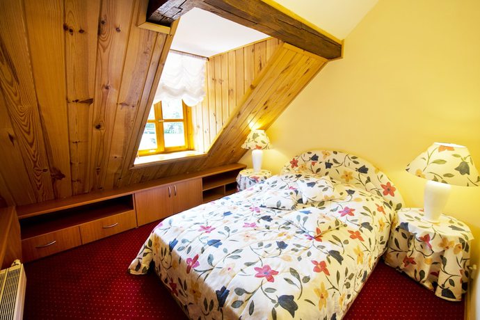 Imagen de la habitación del Hotel Dworek Wapionka. Foto 19