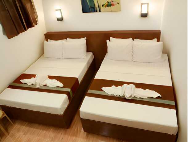 Imagen de la habitación del Hotel Dy Heritage Suites. Foto 11