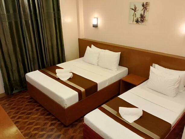 Imagen de la habitación del Hotel Dy Heritage Suites. Foto 12