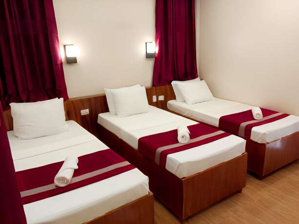 Imagen de la habitación del Hotel Dy Heritage Suites. Foto 13