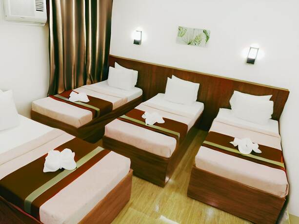 Imagen de la habitación del Hotel Dy Heritage Suites. Foto 14