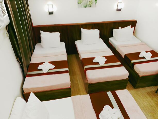 Imagen de la habitación del Hotel Dy Heritage Suites. Foto 15