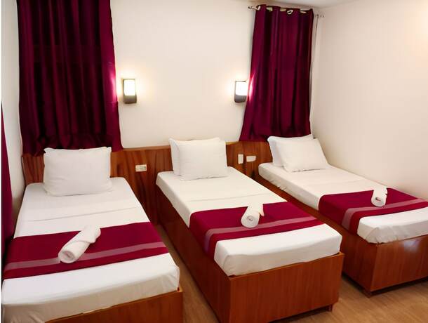 Imagen de la habitación del Hotel Dy Heritage Suites. Foto 16