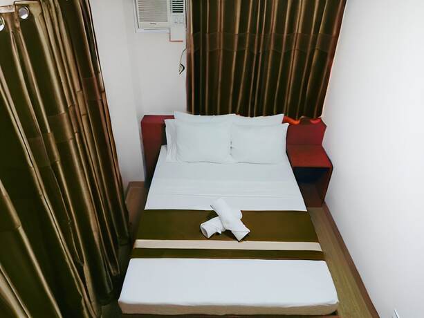 Imagen de la habitación del Hotel Dy Heritage Suites. Foto 18