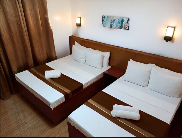 Imagen de la habitación del Hotel Dy Heritage Suites. Foto 19