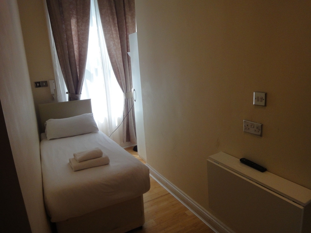 Imagen de la habitación del Hotel Dylan Apartments Kensington. Foto 11