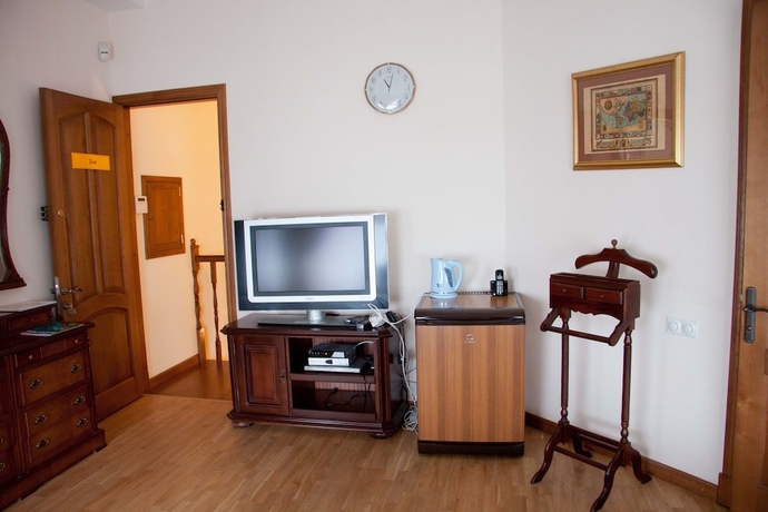 Imagen de la habitación del Hotel Dynasty Apartments. Foto 13