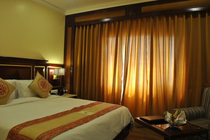 Imagen de la habitación del Hotel Dynasty, Guwahati. Foto 3
